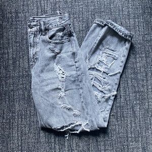 Grey wash distressed girlfriend jeans